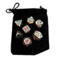 Rug of Smothering metal dnd dice set of 7 on top of black dice pouch